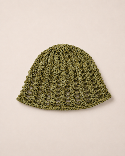 The Capri Hat in olive green, handmade crochet mesh hat crafted from metallic blend yarn, lightweight summer accessory.
