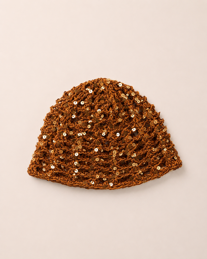 The Capri Hat in olive green, handmade crochet mesh hat crafted from metallic blend yarn, lightweight summer accessory.