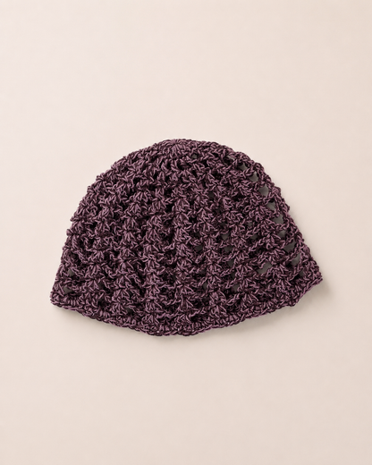 The Capri Hat in olive green, handmade crochet mesh hat crafted from metallic blend yarn, lightweight summer accessory.