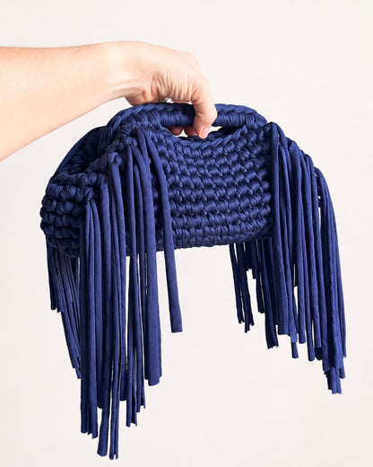 Statement handmade fringe clutch bag designed for dinners events and everyday styling