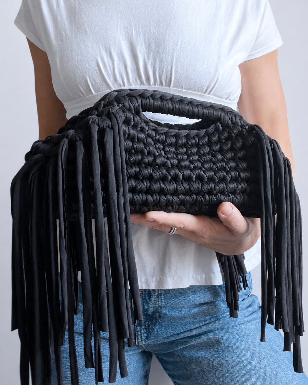 Statement handmade fringe clutch bag styled by hand
