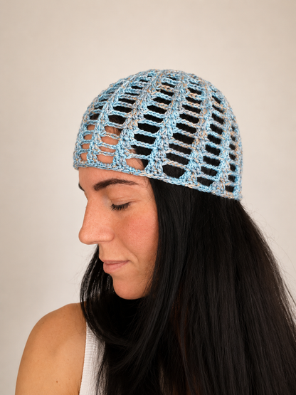 Side view of The Capri Hat, handmade crochet mesh hat in olive green metallic yarn, breathable summer accessory handcrafted in Australia.