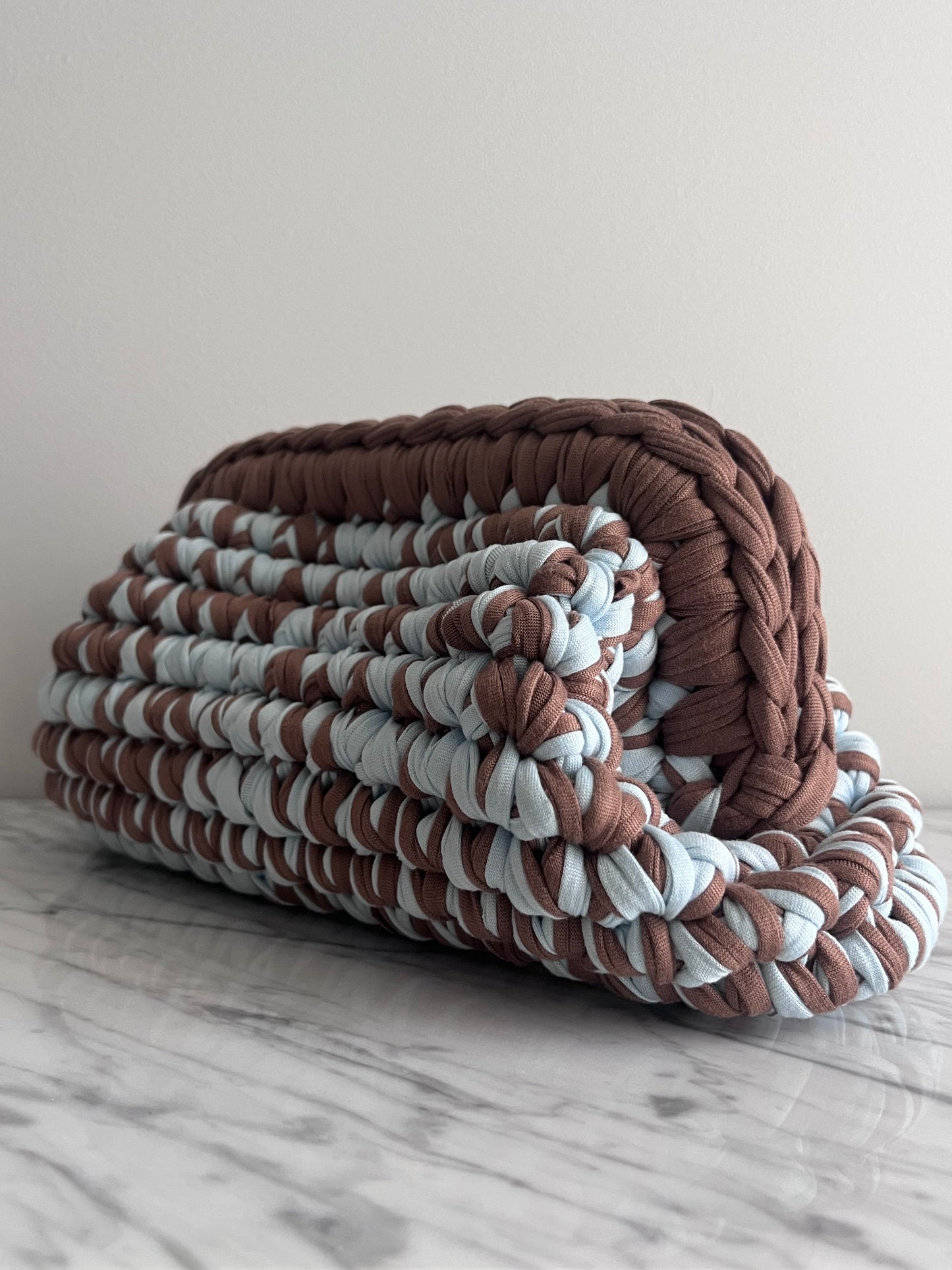 Handmade crochet clutch bag in camel and light blue t-shirt yarn